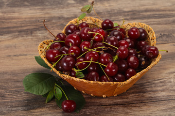 Sweet ripe cherry with leaves
