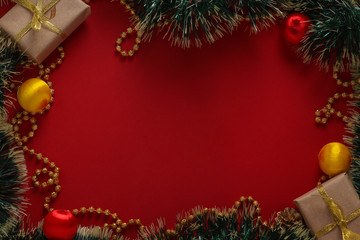 Christmas composition with gifts and xmas tree on red background, Greeting card, Winter holiday