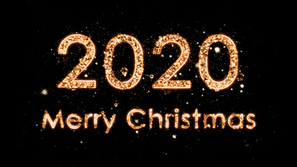 4k Christmas composition with congratulations 2020 and Merry Christmas. The numbers come from the magic sparks of the fireworks. Composition on a black background.