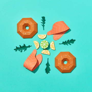 Paper origami pattern handcraft healthy products for sandwich on turquoise background. Ingredients for cooking healthy burger.