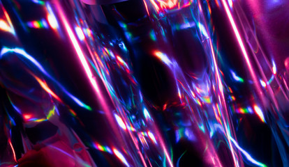 Reflection of light on holographic foils with neon lighting