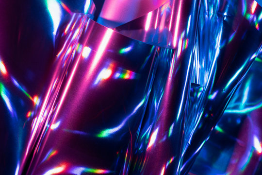 Reflection of light on holographic foils with neon lighting