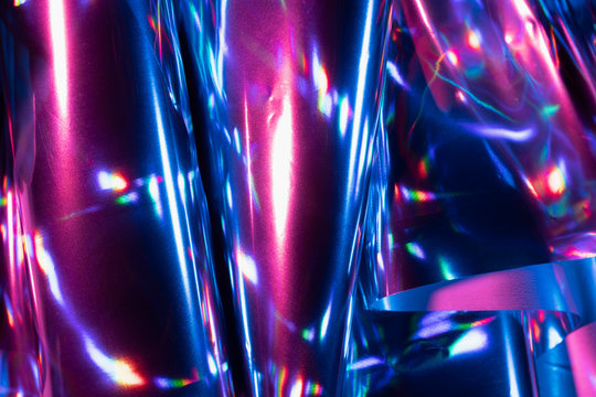 Reflection of light on holographic foils with neon lighting