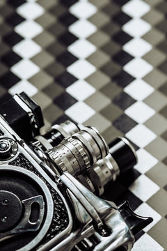 8mm camera on geometric background