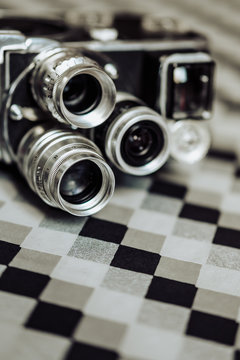 8mm camera on geometric background