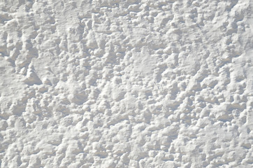 New white painted lime wall closeup