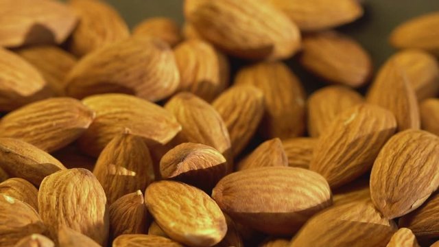 Almonds falling in slow motion