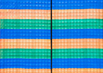 Colorful canvas with square shape floating in wind.