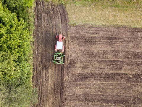 Aerial view from flying drones to an agricultural field with agr