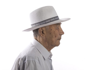 profile portrait of an old man on a white isolated background