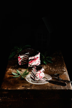 Dark Chocolate Pancakes with Whipped Cream and Pomegranate Syrup