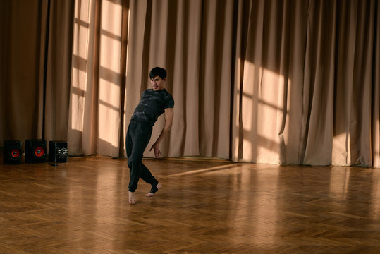 Male dancer training performance in studio