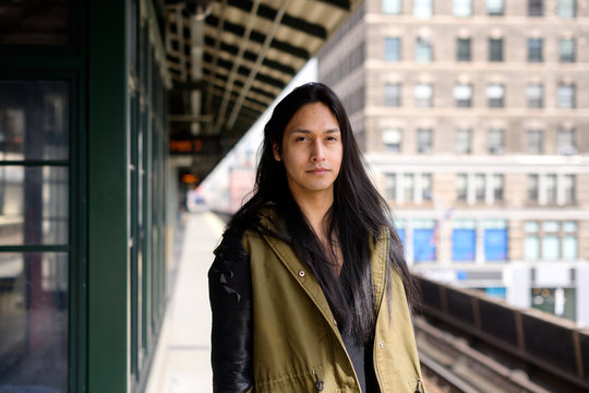 Young man on train platform