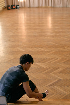 Man preparing for dance in studio