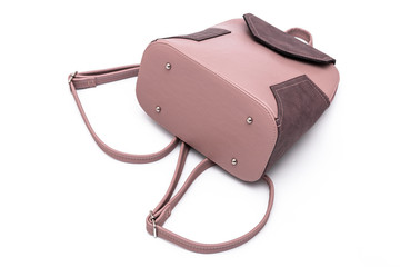 Fashion women leather pink backpack isolated on a white background.