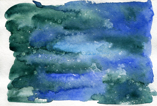 Abstract watercolor painting in blue and dark green