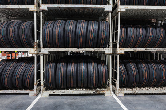 New tires stacked at a warehouse