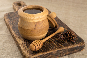 natural honey in a wooden barrel. 