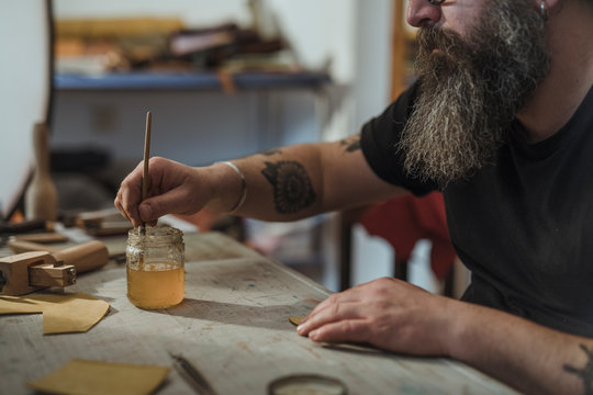 Man Working At Manufacture Of Craft Leather Products