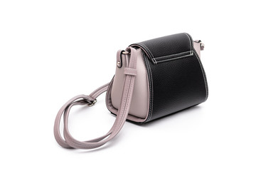 Luxury fashion women leather black handbag isolated on a white background.