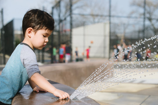 Little kid playing at playground