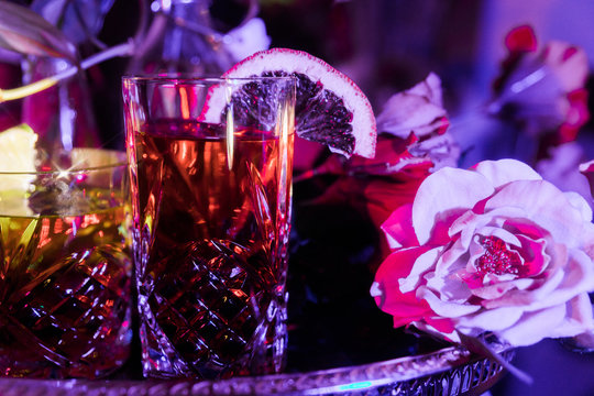 tiki tropical theme tray of drinks with flowers