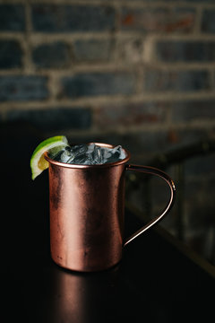 Moscow Mule in front of a Brick Wall