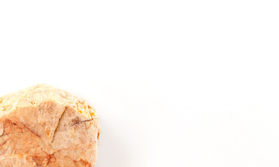 Mineral stone close-up isolated on a white background. A piece of granite or stone on a white background