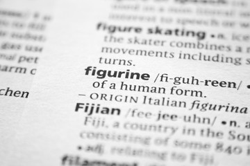Word or phrase Figurine in a dictionary.