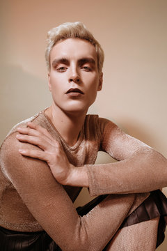 Sensual gay man with beautiful makeup