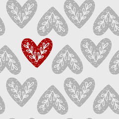 Seamless pattern of hearts with ethnic branch.
