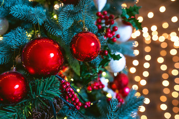 christmas decorations on christmas tree on garland background