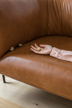 Unrecognisable Woman Lying on Sofa