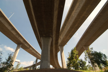 A collection of concrete freeway ramps leading somewhere.