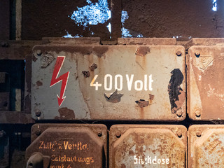 Rusty electric device in the Völklingen Ironworks (Völklingen Hütte), in Germany. This abandoned...