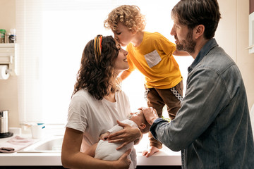 Caucasian family having fun at home