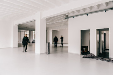 Empty Bright White Industrial Office and Event Space With Blurre