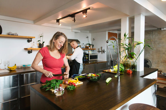 Couple enjoying time together in loft condo home.