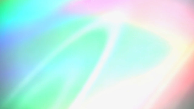 Sparkling holographic light spectrum reflections on paper