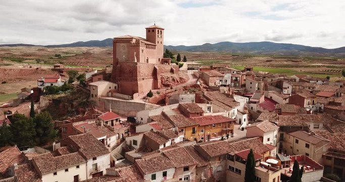 Aerial view of gothic Mudejar Catholic parish church of Santa Tecla in Spanish village Cervera de la Canada