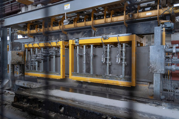 Reinforced concrete plant. The process of cutting a plate into gas silicate blocks
