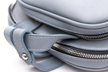 Fototapeta na wymiar Fashion women leather blue backpack isolated on a white background.