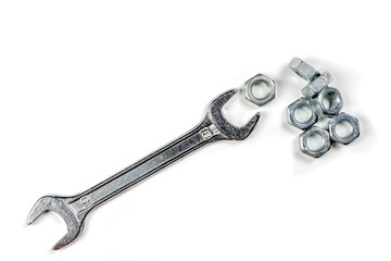 wrench and nuts on a white background