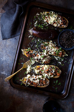 Lamb stuffed aubergines with lentils and cheese
