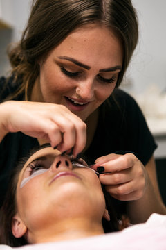 Spa: Aesthetician Applies Eyelash Extensions To Patient