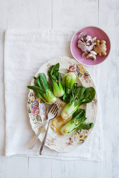 Side dish of Bok choy vegetables stir-fried with garlic and ginger