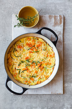Vegetable frittata with squash, zucchini, sweet potato and herbs
