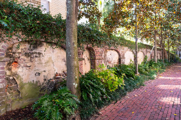 Fototapeta na wymiar Walkway detail showing the variety of traditional southern hardscape construction materials used for in the historic district of Charleston, South Carolina. 