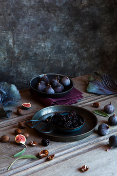 Table setting of fruits and nuts