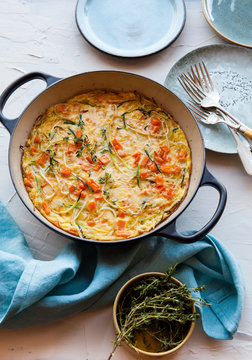 Vegetable frittata with squash, zucchini, sweet potato and herbs